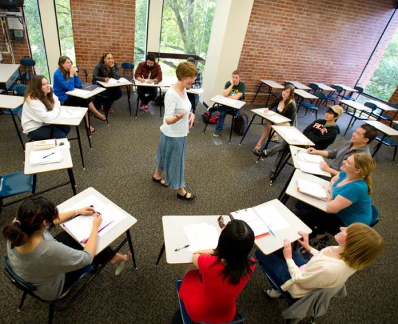 Class of students sitting in a circle