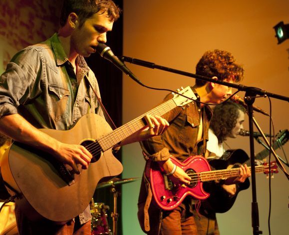 Band playing guitars