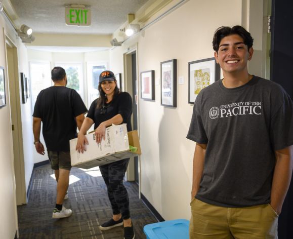 student standing in hallway