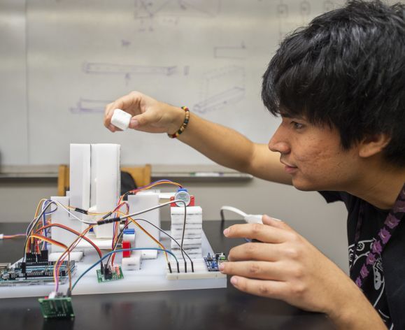 student working on senior project