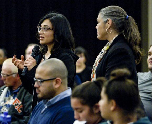 student at María Hinojosa lecture