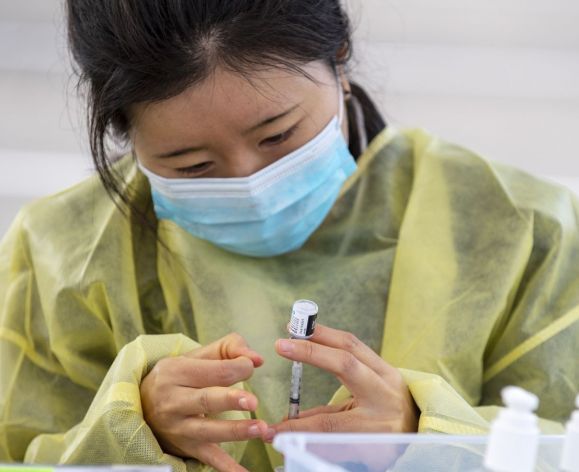 Student preparing vaccine