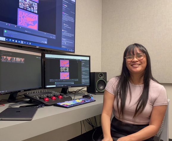 student working at editing bay