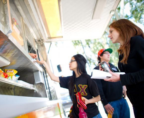 Students buying food at E.A.T. truck