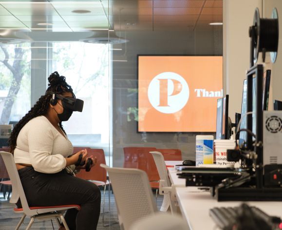 a student experimenting with virtual reality