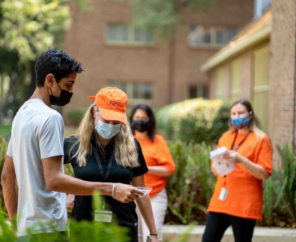 a student consults a university of the pacific staff member