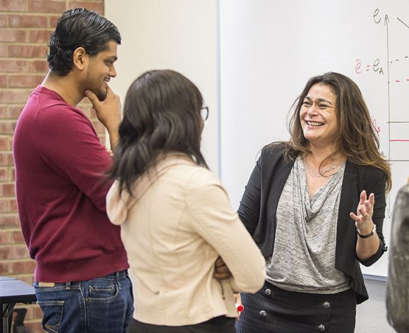 the professor talking to students