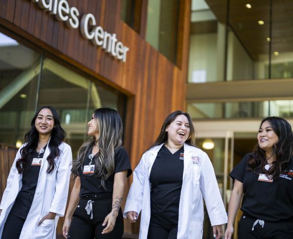 School of Health Sciences students walk together
