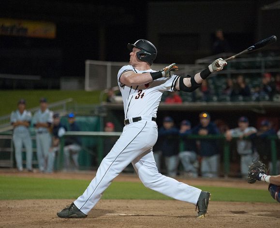 baseball student swinging a bat
