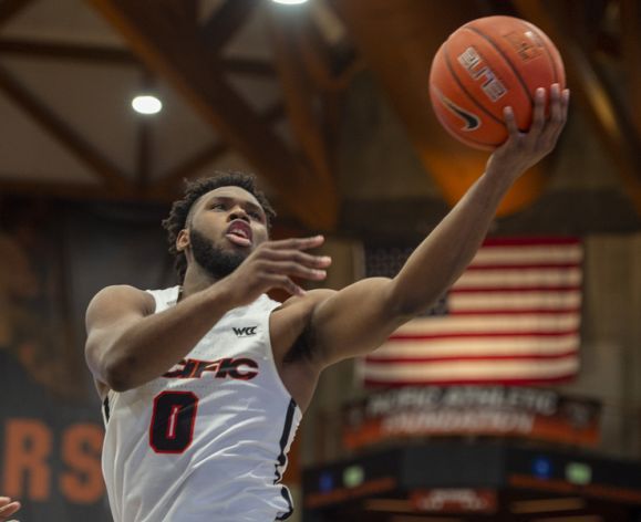 basketball student scoring a point