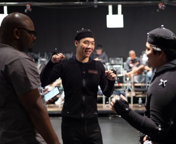student in motion capture suit