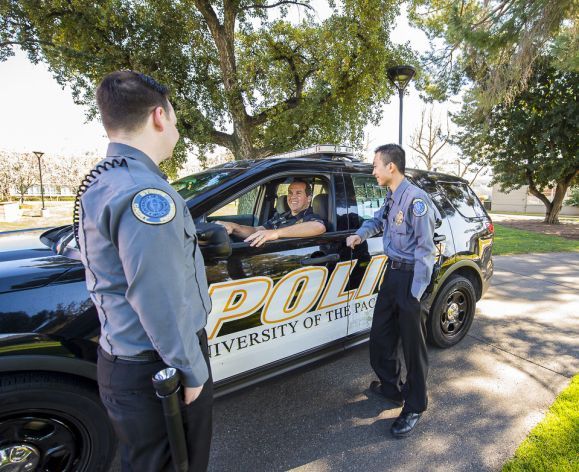 public safety officers outside in the car