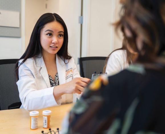 Student in the Doctor of Pharmacy (PharmD) program works with community members in a clinic on University of the Pacific's Stockton campus.