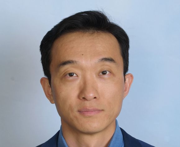 Image shows the face of UOP faculty member Dr. Long Wang.