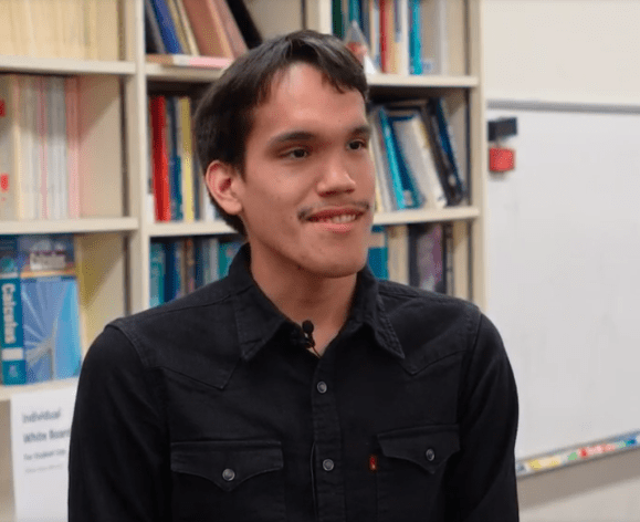 Oscar Avalos, math major, in a study room