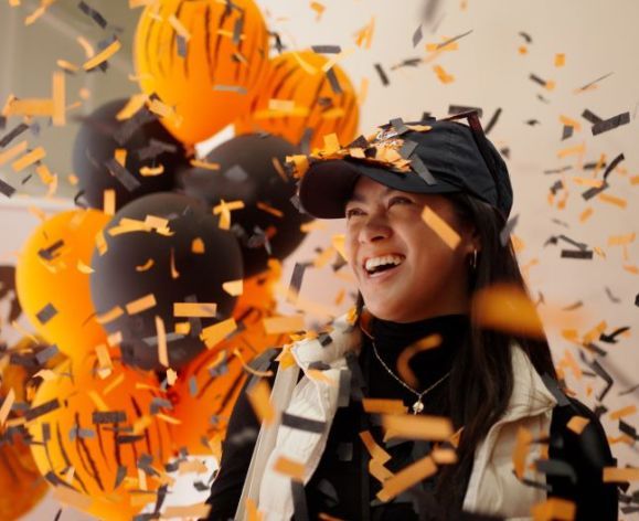 smiling girl with pacific confetti