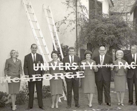 historic photo of people holding mcgeorge sign