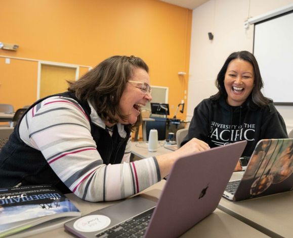 cohort members laughing together