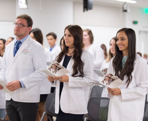 Students in white coats