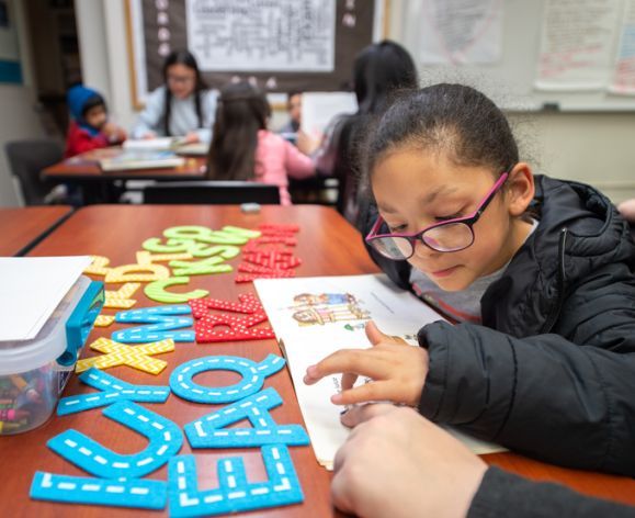 students doing literacy activities