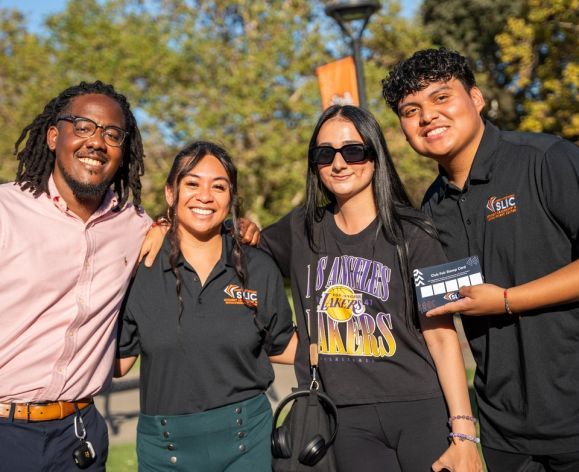 a group with SLIC shirts