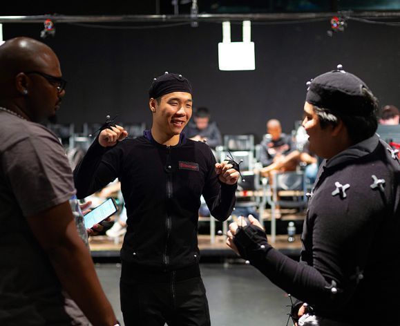 student in motion capture suit
