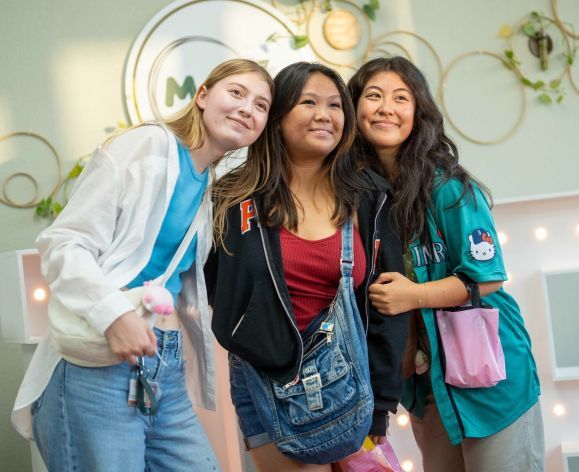 three students posing for a photo