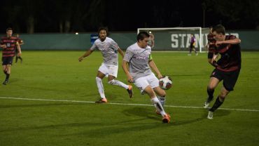 students playing soccer