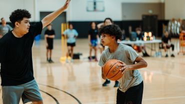 A basketball about to go in the net