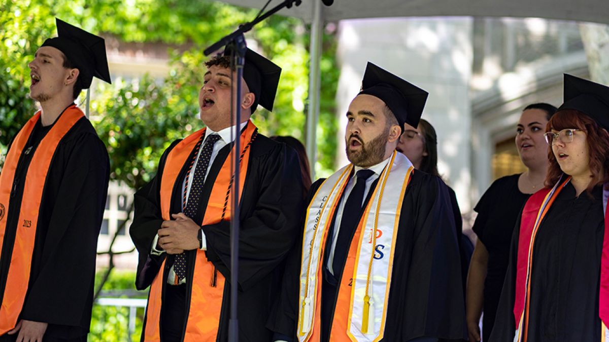 Filo singing at his own commencement ceremony