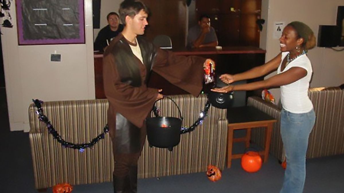 Two students participate in Halloween activities in Southwest Hall.